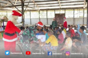 Satgas Pamtas Kewilayahan Yonif 125/SMB Sambut Bulan Penuh Kasih Dengan Bagikan 1000 Bingkisan Kasih kepada Masyarakat Papua